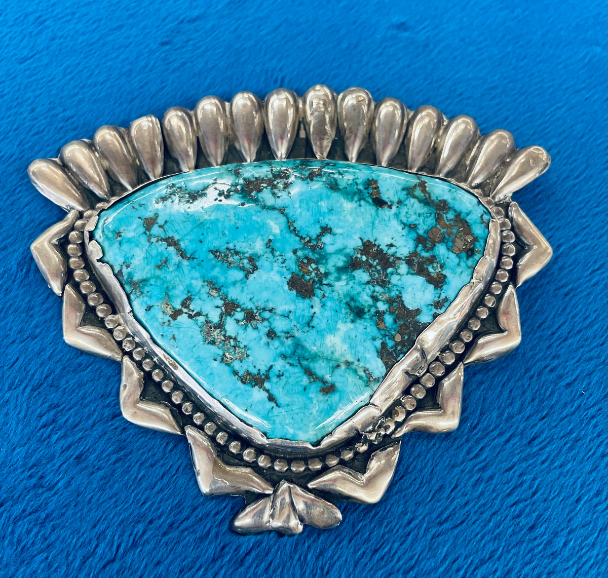 Round sterling silver and turquoise hand stamped pin. main image 0