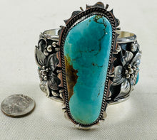 Load image into Gallery viewer, Large Turquoise Stone with Silver Flowers Bracelet
