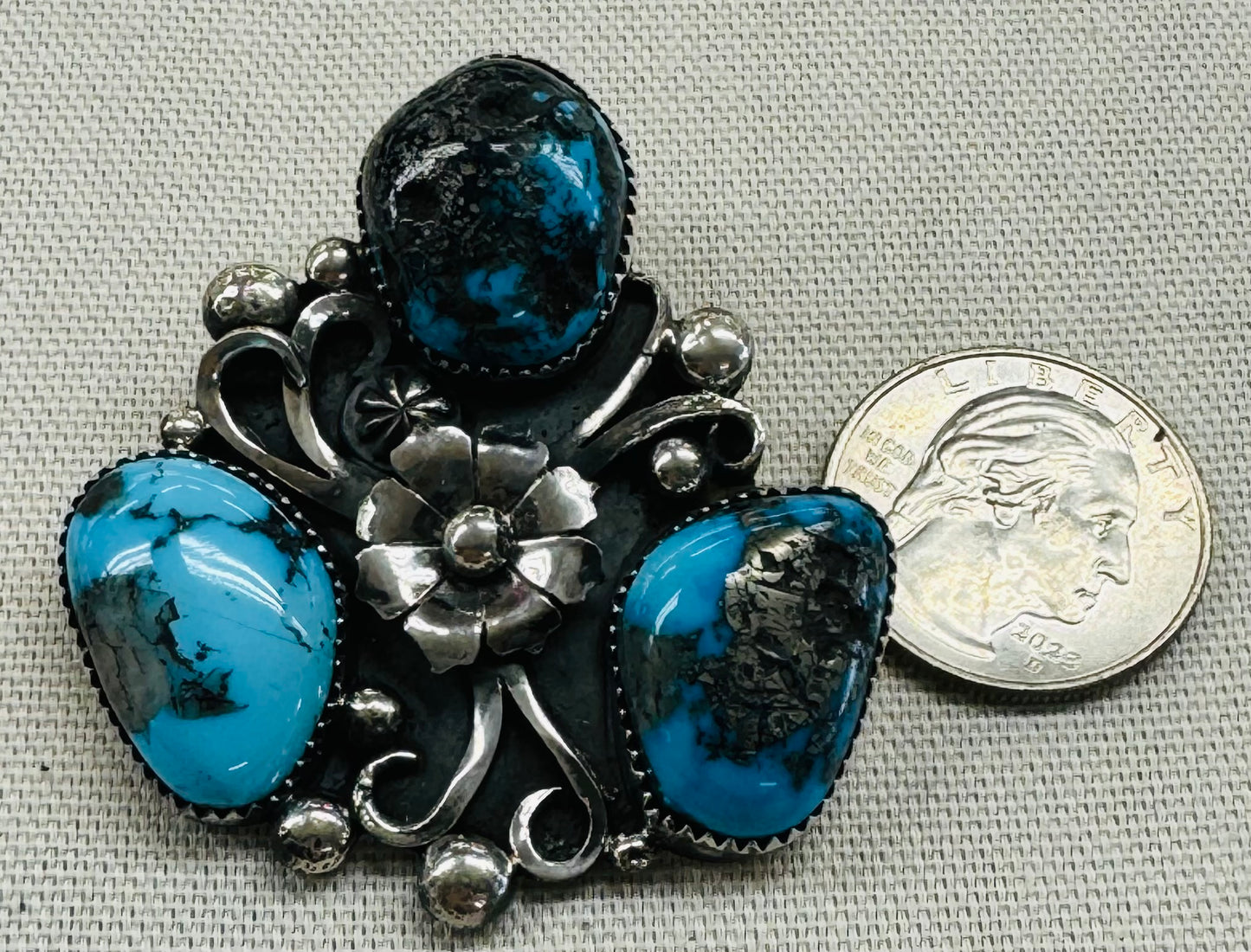 Three Turquoise Stones with Silver Flower Pendant