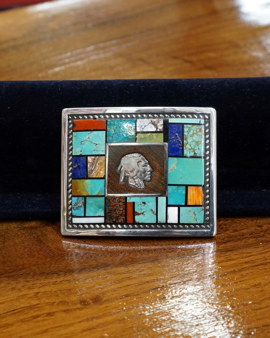 Buckle with assorted stones and nickel head