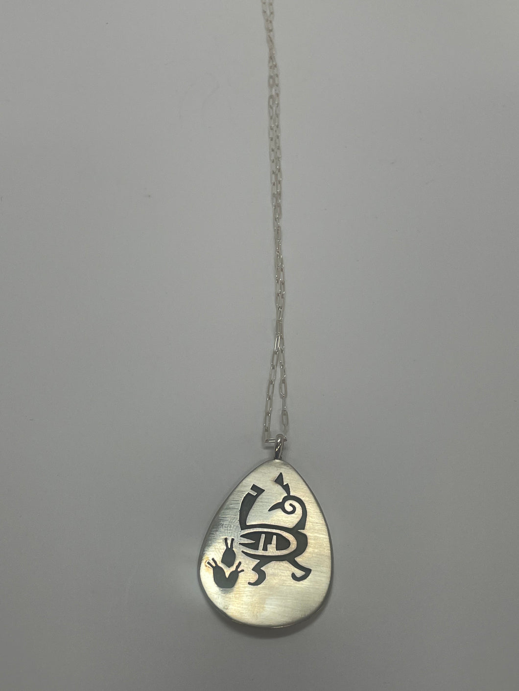 Hopi chain and bird pendant