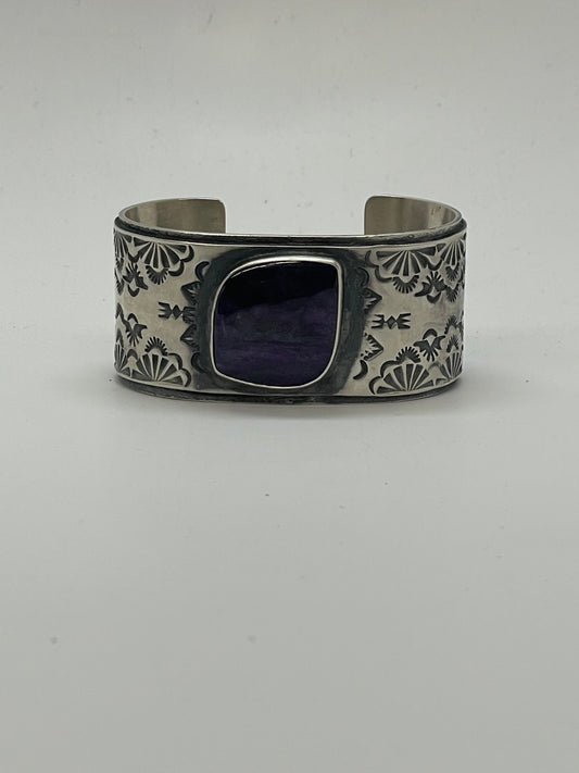 Purple sugilite with stamp